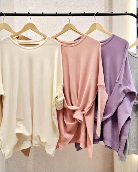 Sweater poncho con tajo